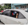 14 inch Android taxi headrest display installed on a vehicle seat for passenger advertising.